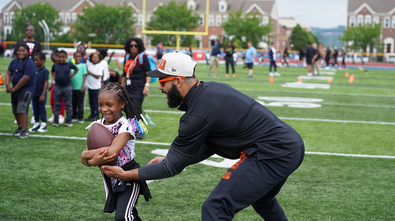 Bengals Rookies play flag football with schoolkids